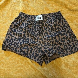 Dressed in LALA Brown and Black Athletic Shorts Leopard Print